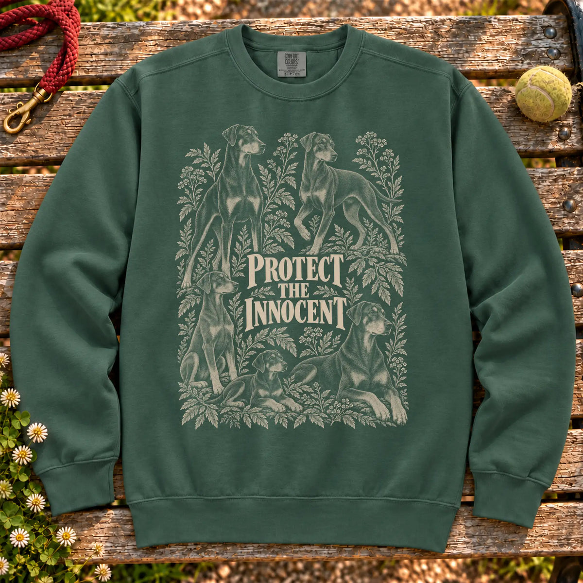 Protect the Innocent Doberman design on a Blue Spruce sweatshirt