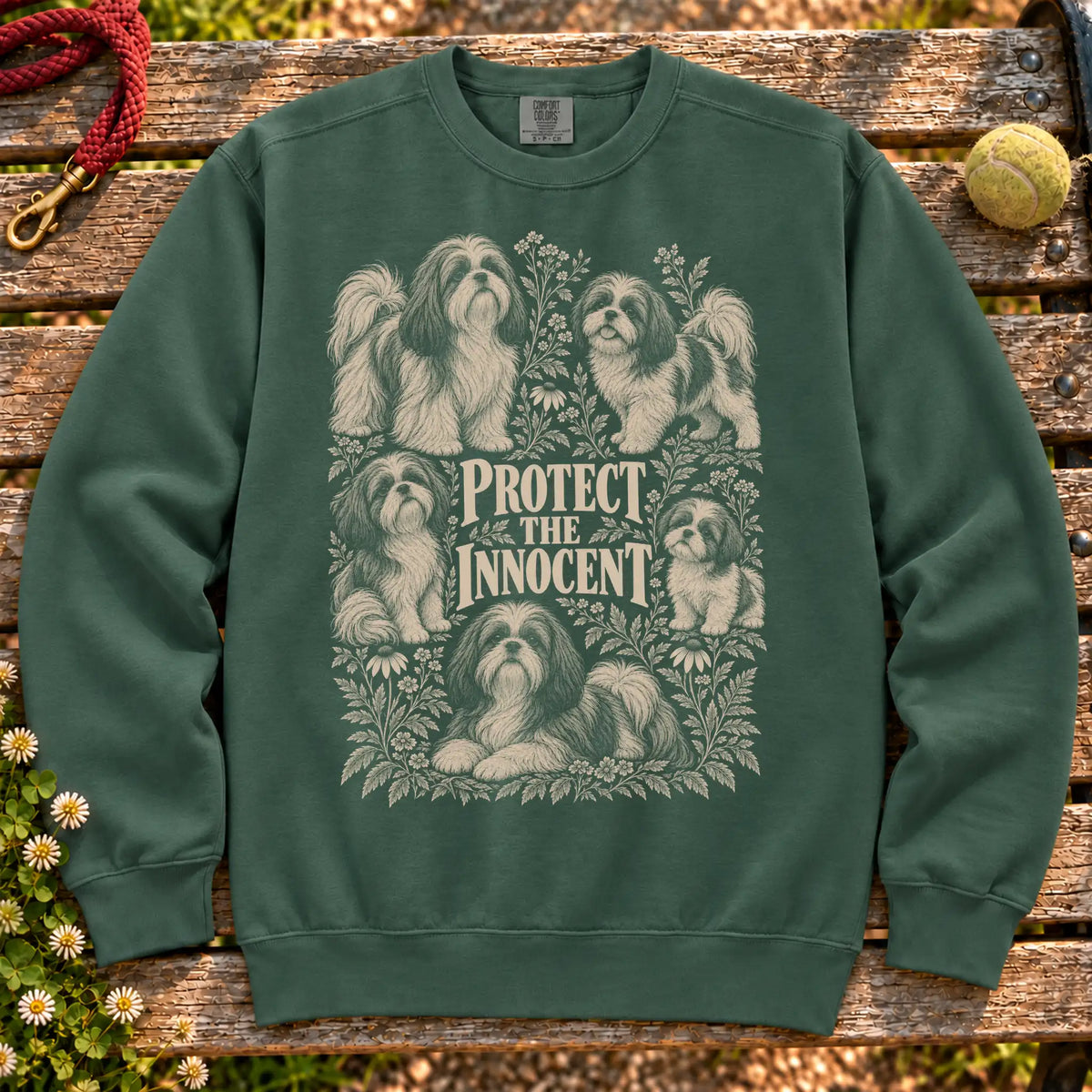 Protect the Innocent Shih Tzu design on a Blue Spruce sweatshirt