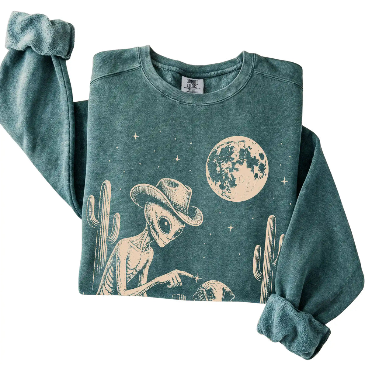 Blue Spruce Comfort Colors® sweatshirt featuring Pug Cowboy and Alien, folded presentation