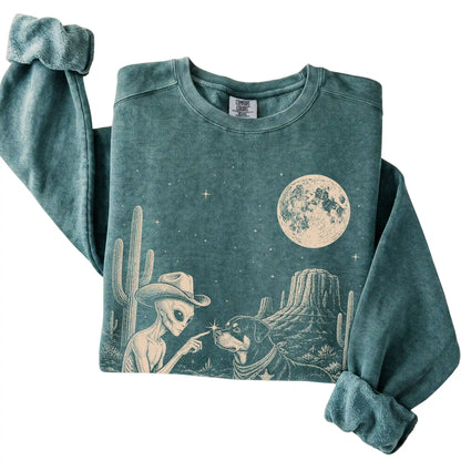 Blue Spruce Comfort Colors® sweatshirt featuring Rottweiler Cowboy and Alien, folded presentation
