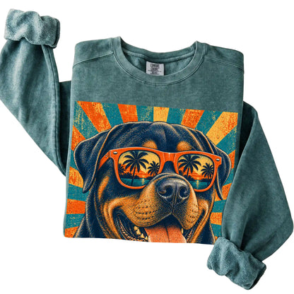 Folded Blue Spruce Comfort Colors sweatshirt with a Retro Rottweiler Dad design