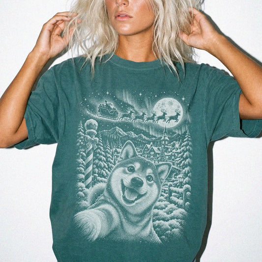 Woman wearing a Blue Spruce Shiba Inu Santa Selfie T-shirt
