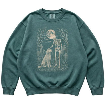 Skeleton petting a Goldendoodle in a graveyard on a Blue Spruce sweatshirt