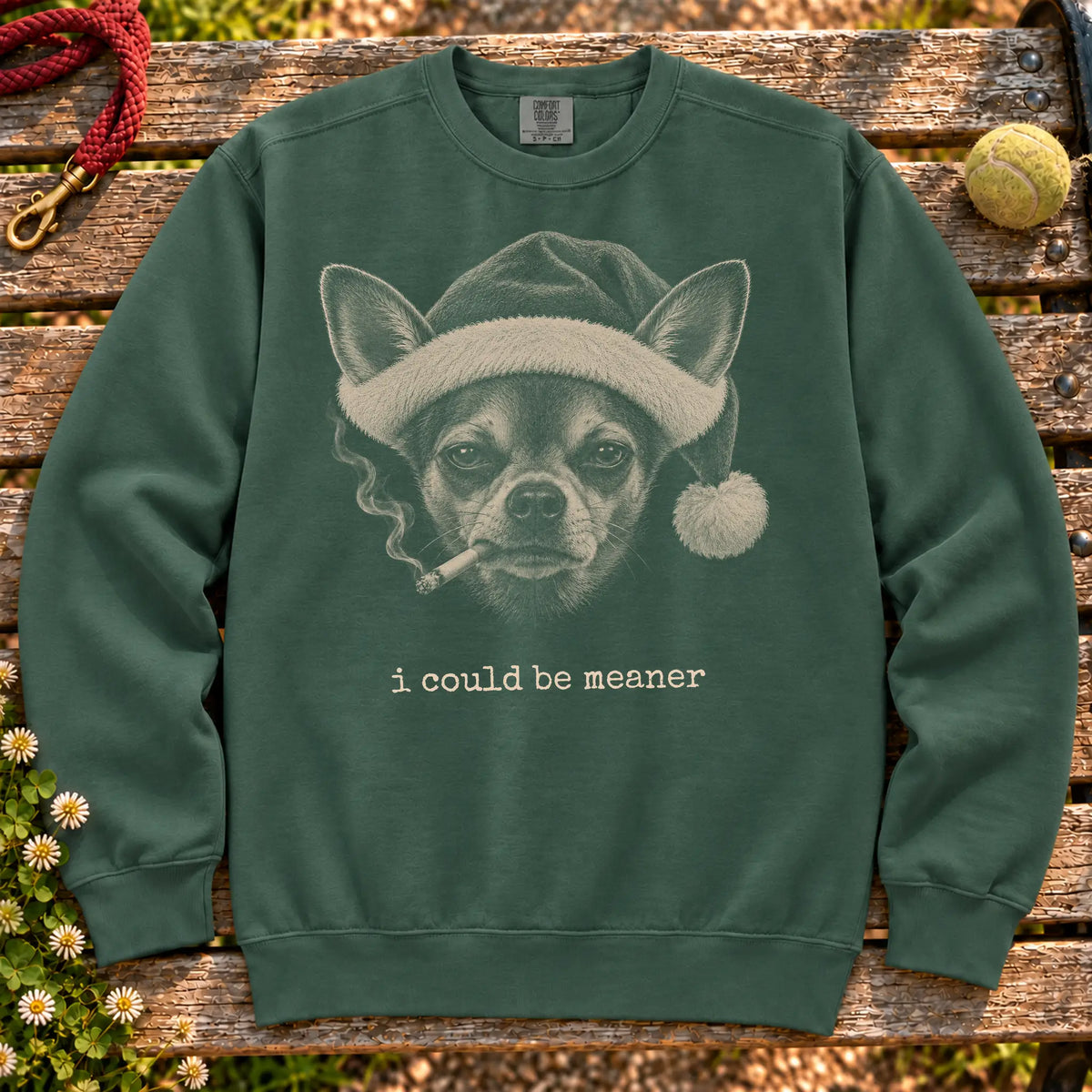 Chihuahua wearing a Santa hat and smoking on a Blue Spruce sweatshirt