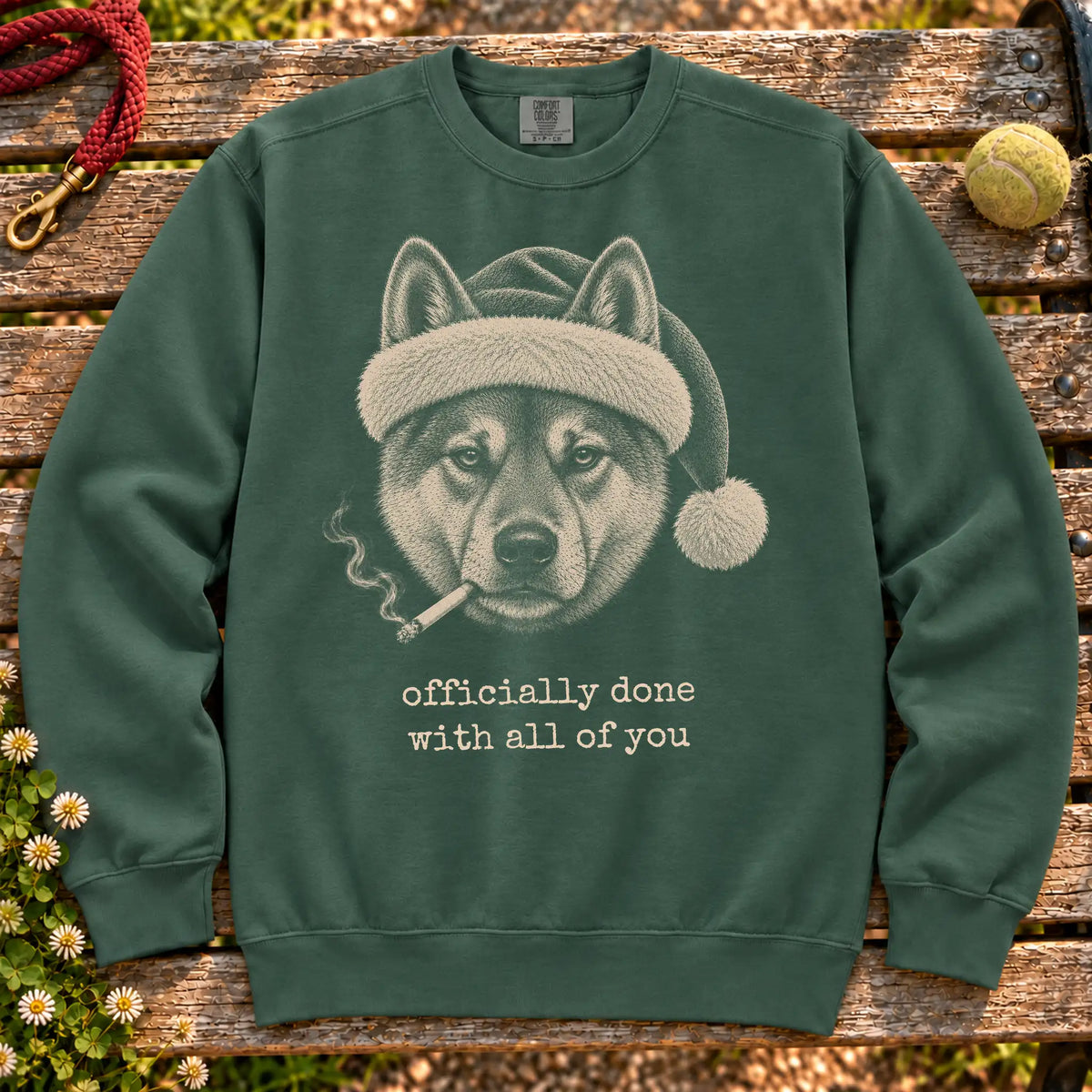 Shiba Inu wearing a Santa hat and smoking on a Blue Spruce sweatshirt