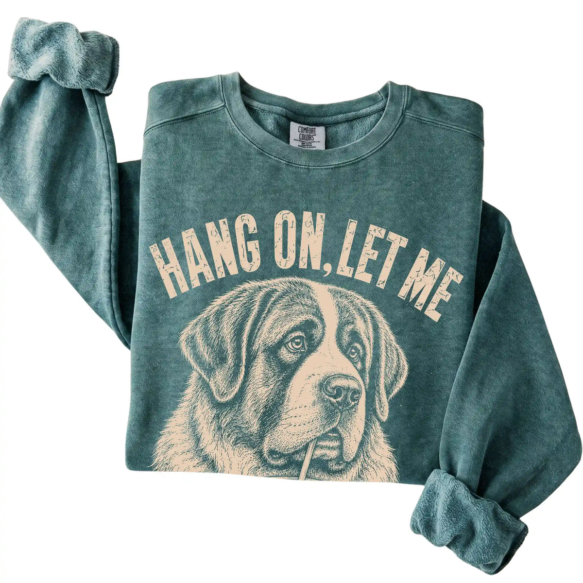 Blue Spruce Comfort Colors sweatshirt featuring St Bernard Iced Coffee Overthink, folded presentation