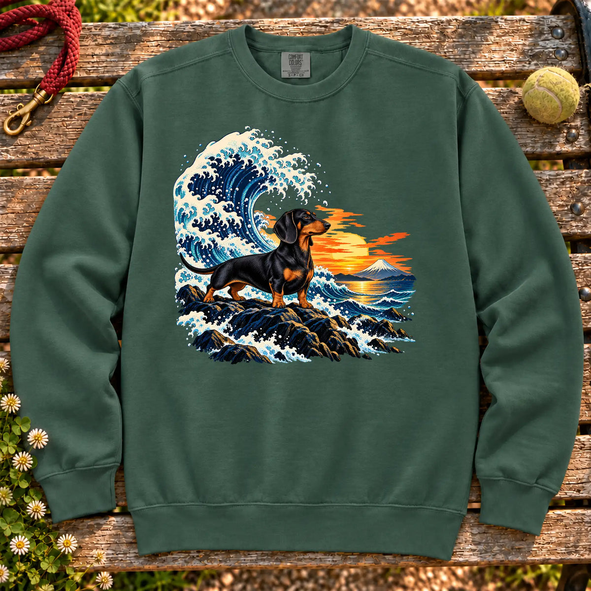 Dachshund dog with ocean waves, sunset and Mount Fuji on a Blue Spruce Comfort Colors sweatshirt