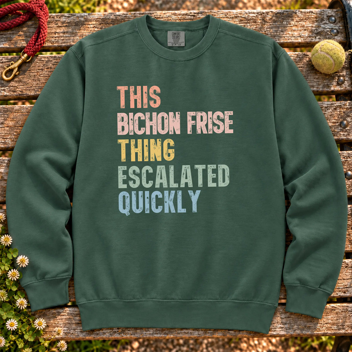 “This Bichon Frise thing escalated quickly” text on a Blue Spruce sweatshirt