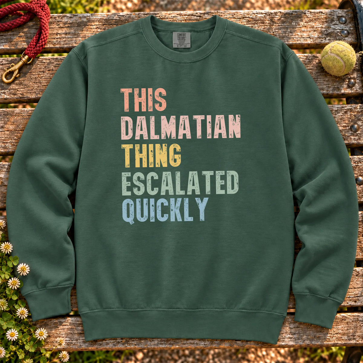 “This Dalmatian thing escalated quickly” text on a Blue Spruce sweatshirt