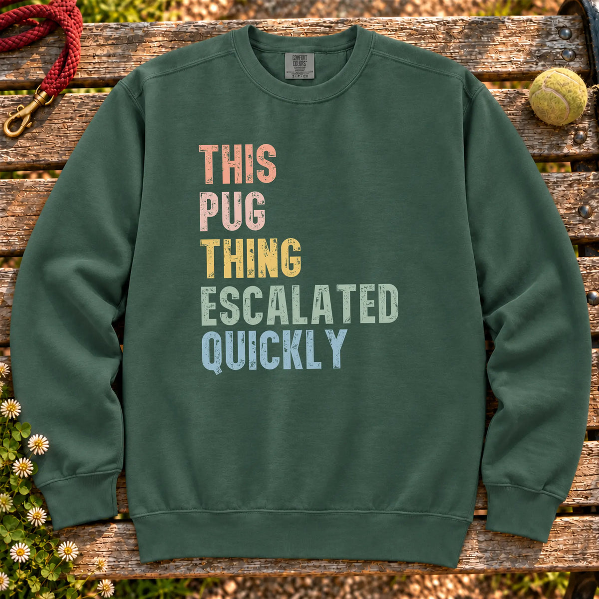 “This Pug thing escalated quickly” text on a Blue Spruce sweatshirt