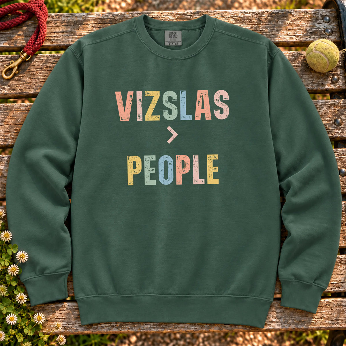 Vizslas greater than people text design on a Blue Spruce Comfort Colors sweatshirt