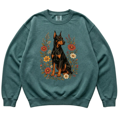 Blue Spruce Comfort Colors® sweatshirt with Doberman portrait and wildflowers, flat lay