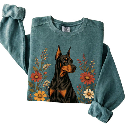 Blue Spruce Comfort Colors® sweatshirt with Doberman portrait and wildflowers, folded view