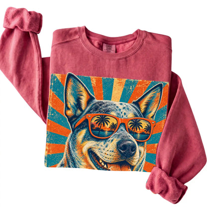 Folded Crimson Comfort Colors sweatshirt with a Retro Blue Heeler Dad design