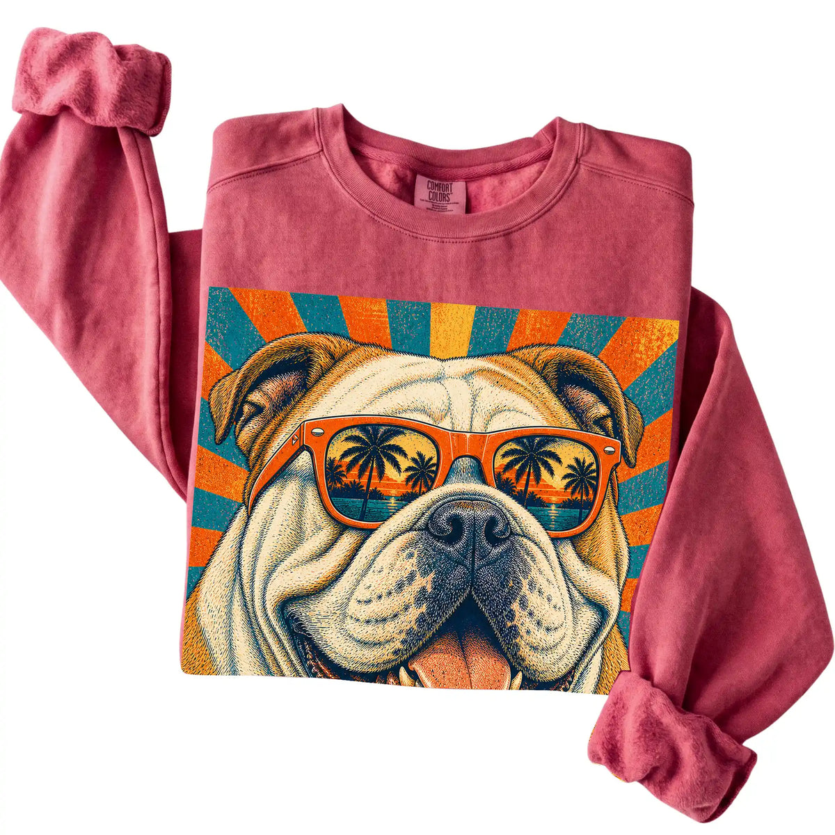 Folded Crimson Comfort Colors sweatshirt with a Retro Bulldog Dad design