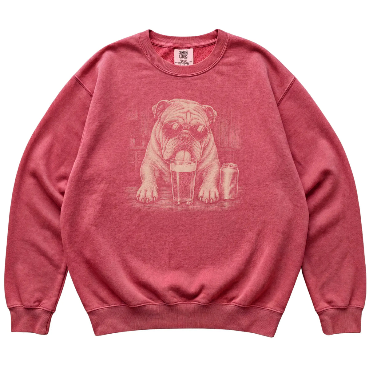 Crimson English Bulldog drinking from a pint at a bar, laid flat