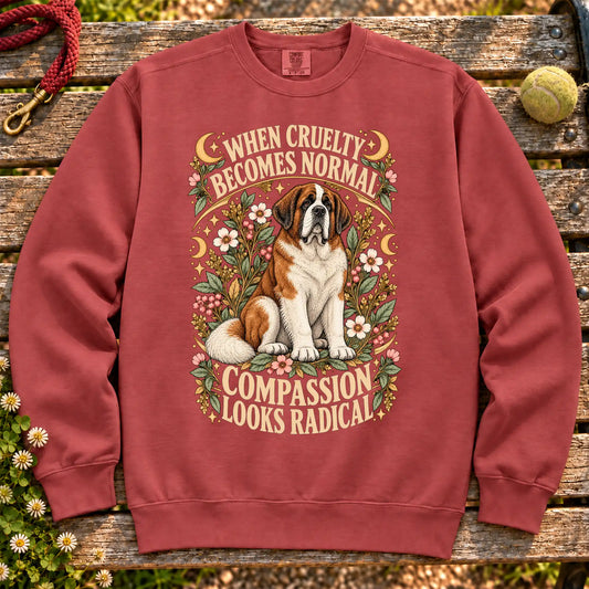 Compassion Looks Radical Saint Bernard design on a Crimson Comfort Colors sweatshirt