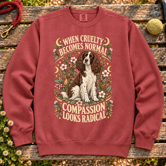 Compassion Looks Radical Springer Spaniel design on a Crimson Comfort Colors sweatshirt
