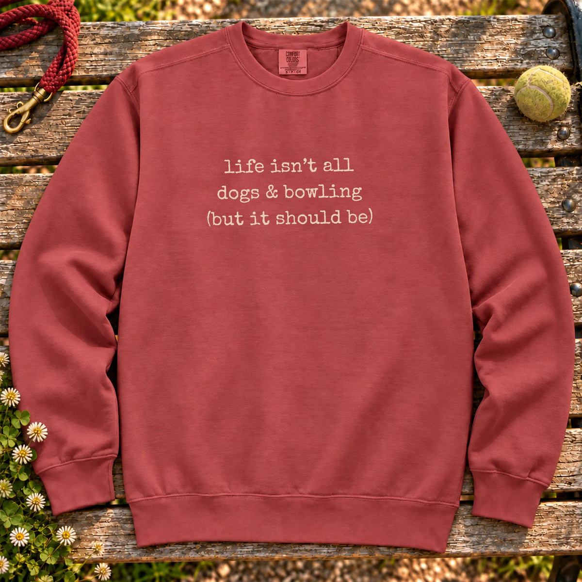 Dogs & Bowling design on a Crimson crewneck sweatshirt, shown flat
