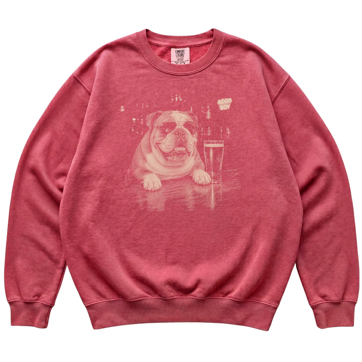 Crimson English Bulldog at a bar beside a pint, laid flat