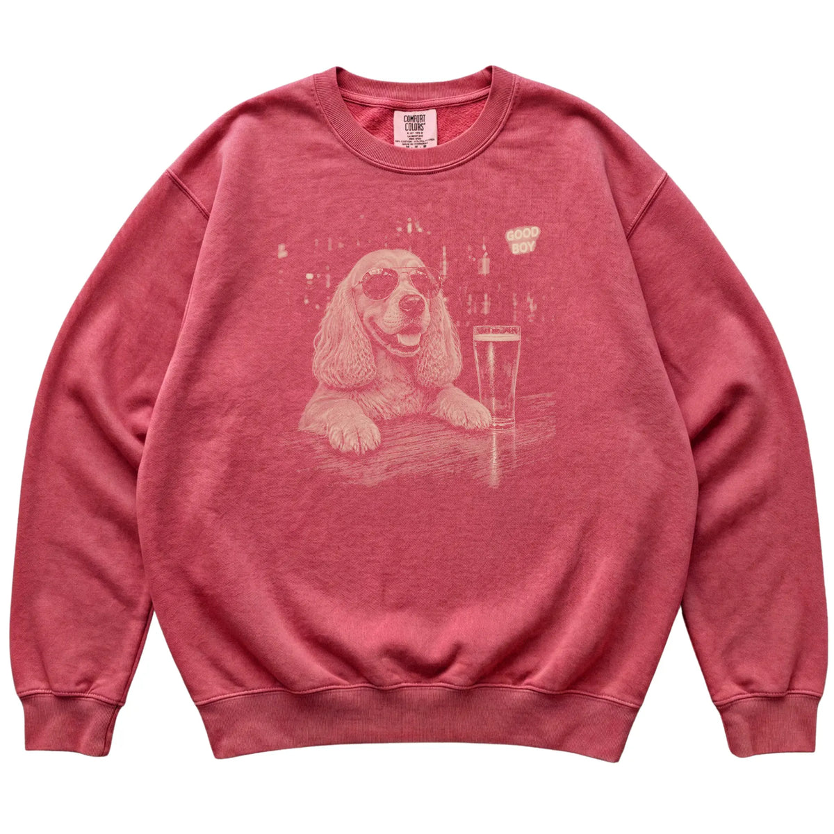 Crimson Cocker Spaniel at a bar beside a pint, laid flat