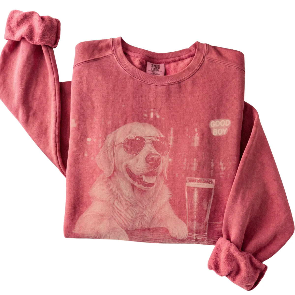 Crimson Golden Retriever at a bar beside a pint, folded detail view