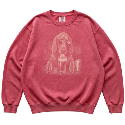 Crimson Irish Setter drinking from a pint at a bar, laid flat