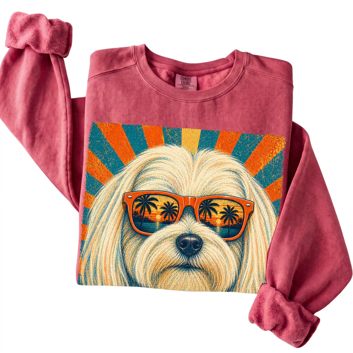 Folded Crimson Comfort Colors sweatshirt with a Retro Maltese Dad design