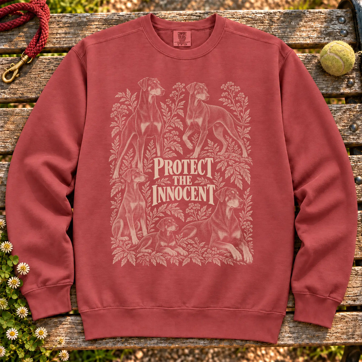 Protect the Innocent Doberman design on a Crimson sweatshirt