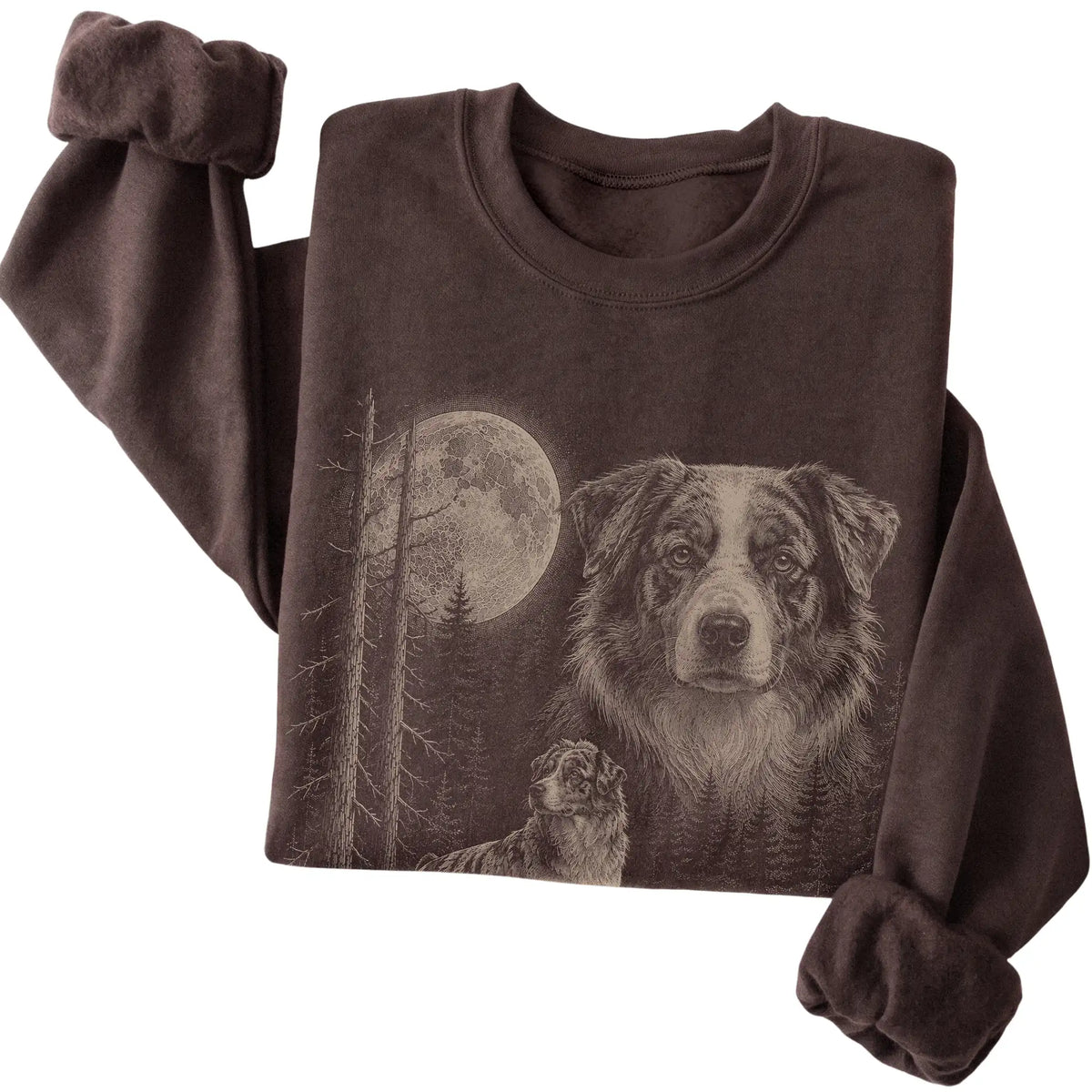 Folded dark chocolate crewneck sweatshirt showing the Australian Shepherd Moonlit Forest graphic