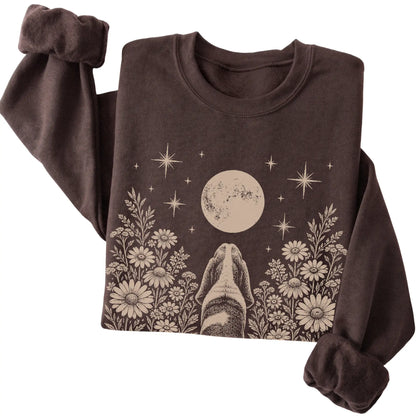 Dark Chocolate crewneck sweatshirt featuring Wildflower Moon Basset Hound, folded presentation