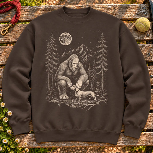 Dachshund Bigfoot Petting on a Dark Chocolate crewneck sweatshirt, shown flat
