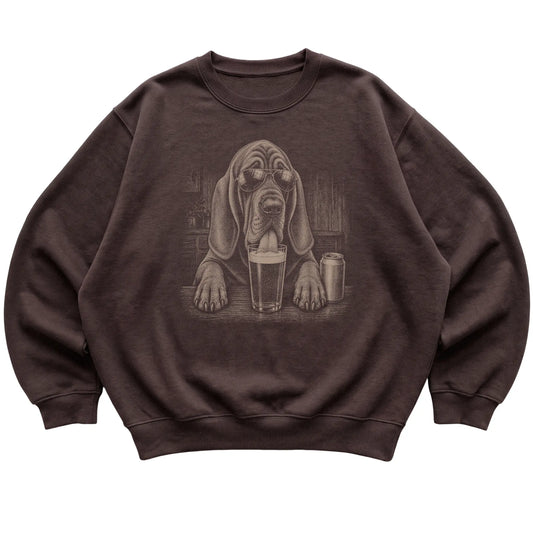 Dark Chocolate Bloodhound drinking from a pint at a bar, laid flat