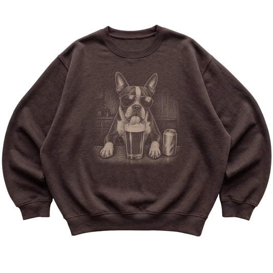 Dark Chocolate Boston Terrier drinking from a pint at a bar, laid flat