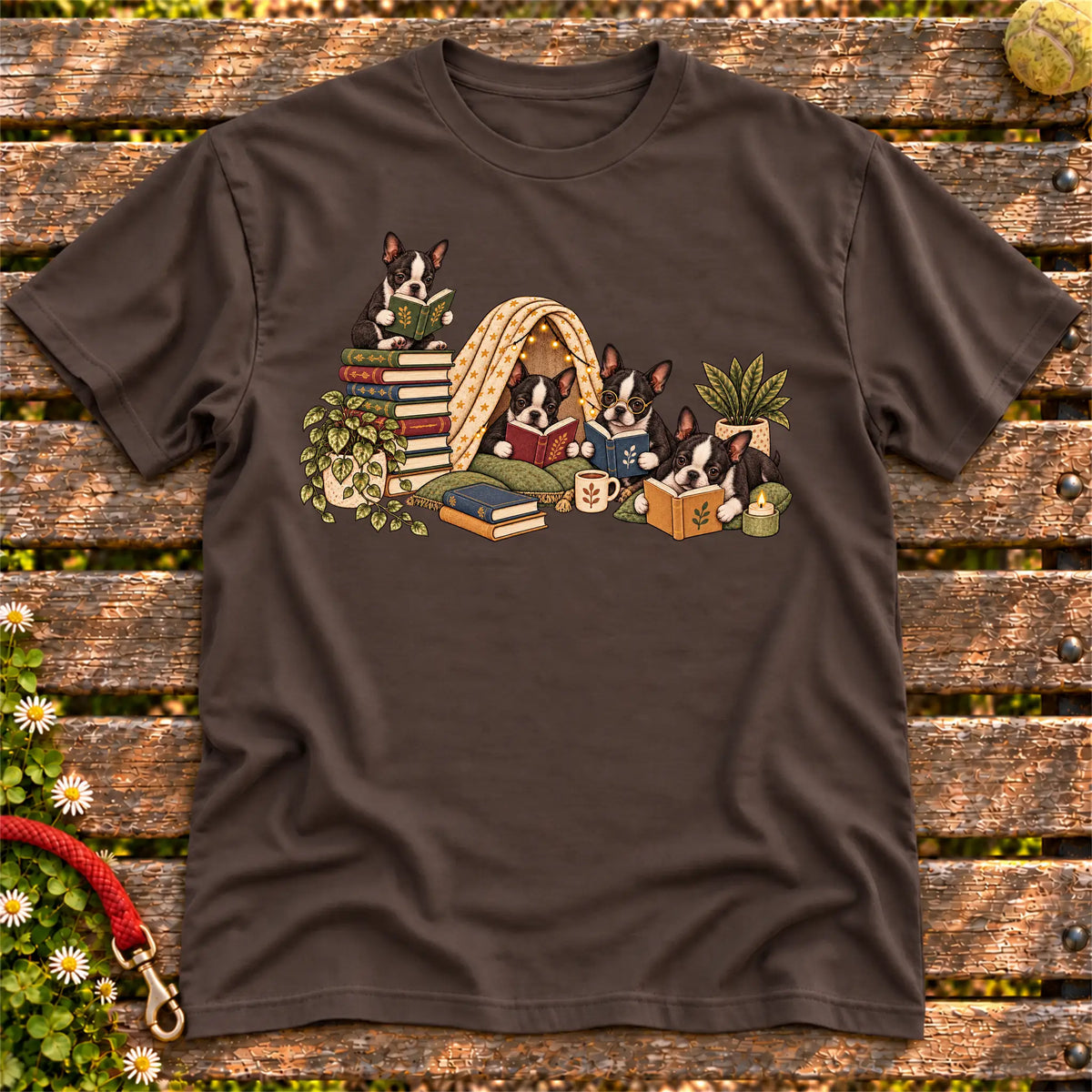 Boston Terrier puppies reading books in a cozy blanket fort on a Dark Chocolate T-shirt