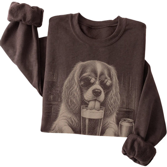 Dark Chocolate Cavalier drinking from a pint at a bar, folded detail view