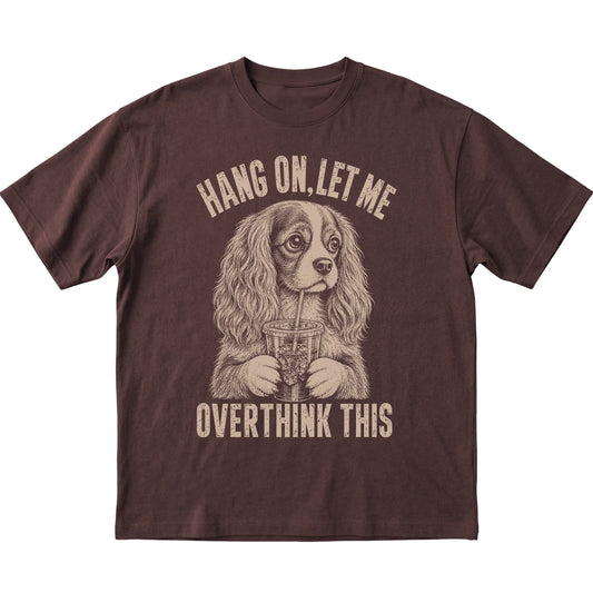 Dark Chocolate T-shirt featuring Overthinking Cavalier King Charles Spaniel, laid-flat presentation