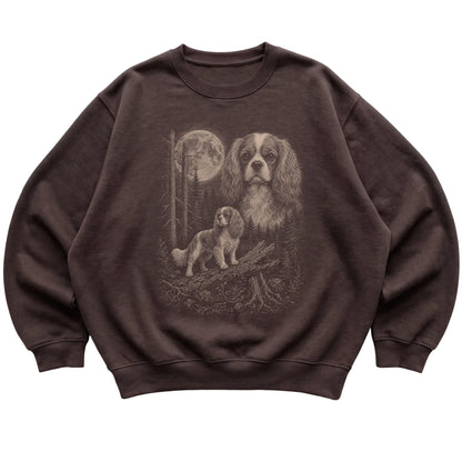 Cavalier King Charles Spaniel Moonlit Forest graphic on a dark chocolate crewneck sweatshirt laid flat