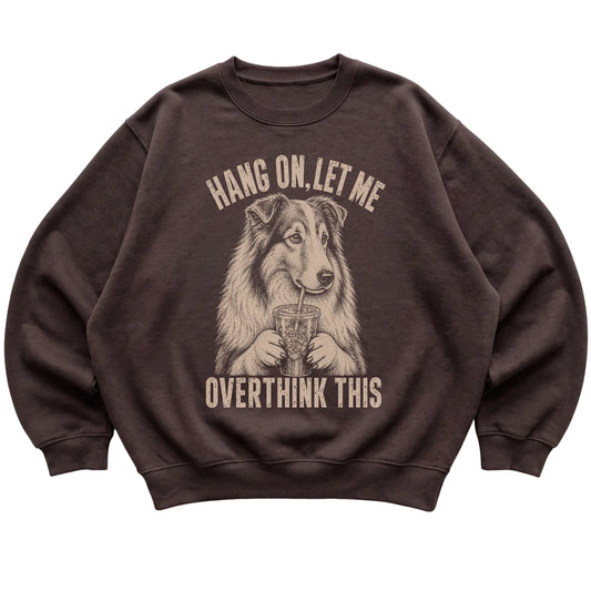 Dark Chocolate crewneck sweatshirt featuring Overthinking Collie, laid-flat presentation