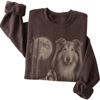 Folded dark chocolate crewneck sweatshirt showing the Collie Moonlit Forest graphic