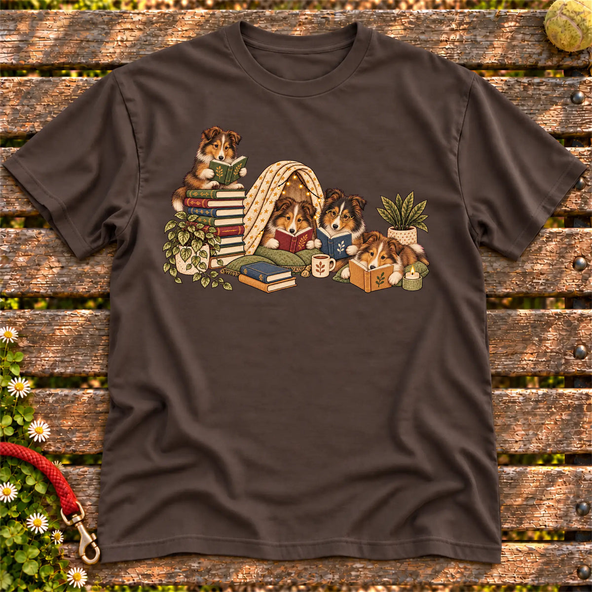 Collie puppies reading books in a cozy blanket fort on a Dark Chocolate T-shirt