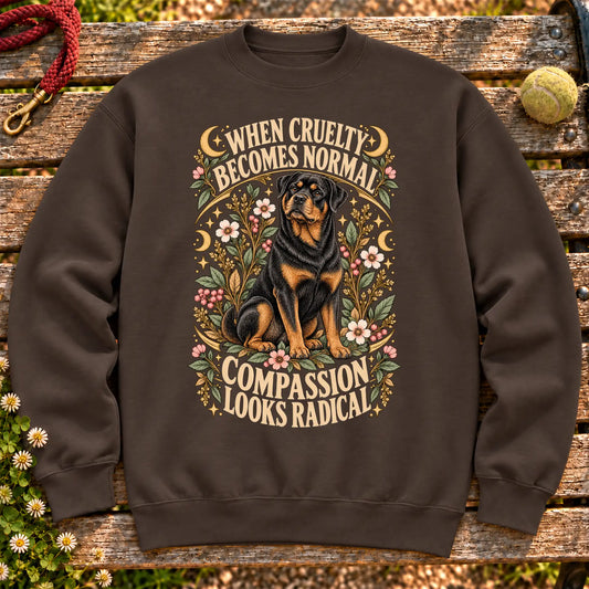 Compassion Looks Radical Rottweiler design on a Dark Chocolate Gildan sweatshirt