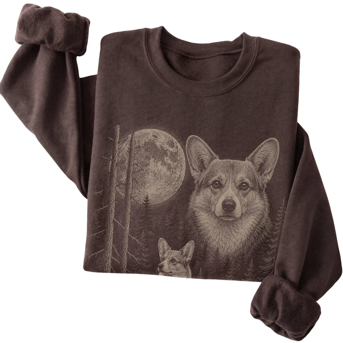 Folded dark chocolate crewneck sweatshirt showing the Corgi Moonlit Forest graphic