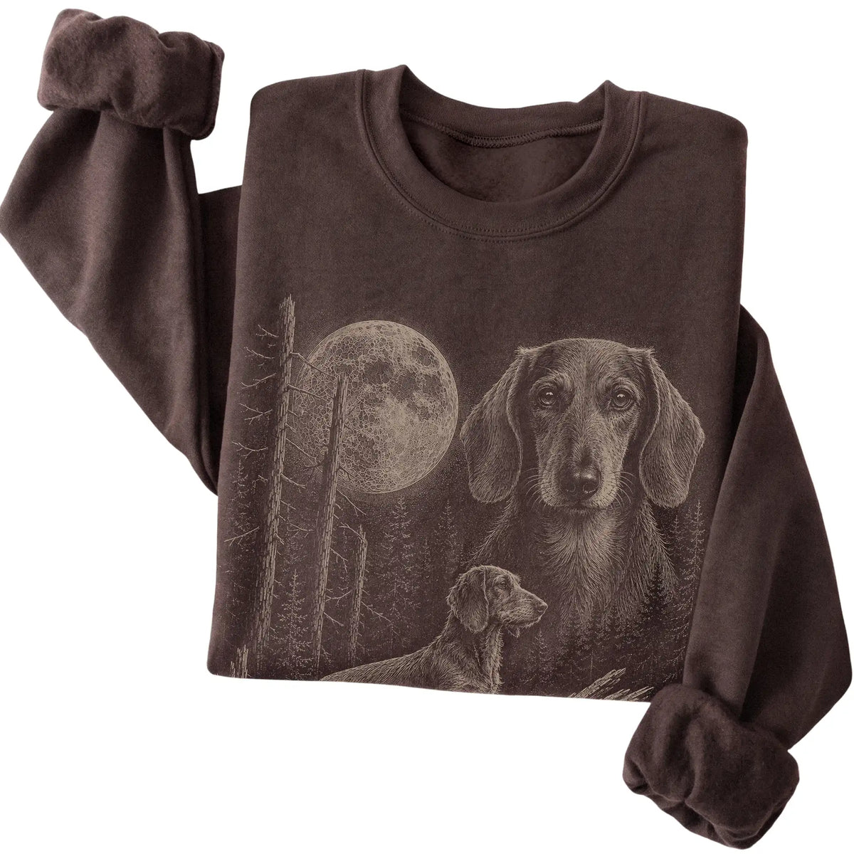 Folded dark chocolate crewneck sweatshirt showing the Dachshund Moonlit Forest graphic