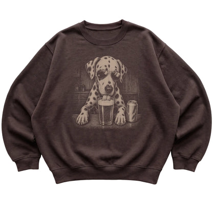 Dark Chocolate Dalmatian drinking from a pint at a bar, laid flat
