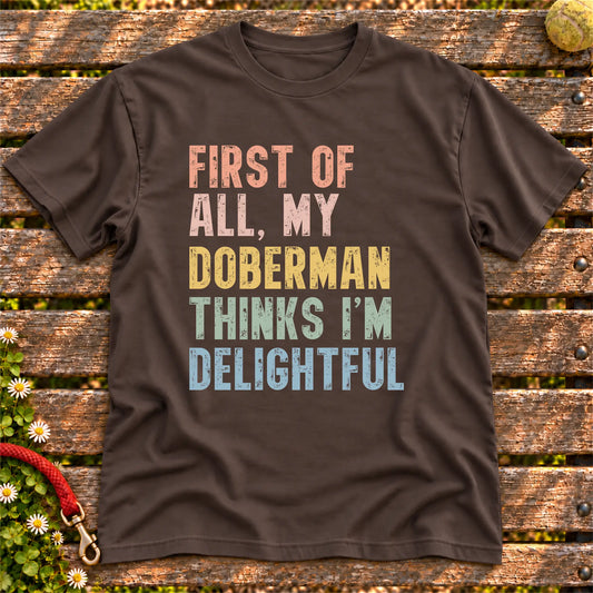 “First of all, my Doberman thinks I’m delightful” text on a Dark Chocolate T-shirt