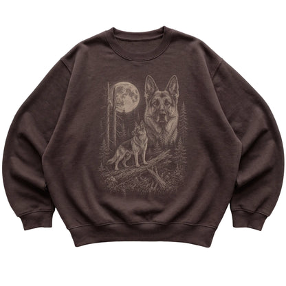 German Shepherd Moonlit Forest graphic on a dark chocolate crewneck sweatshirt laid flat