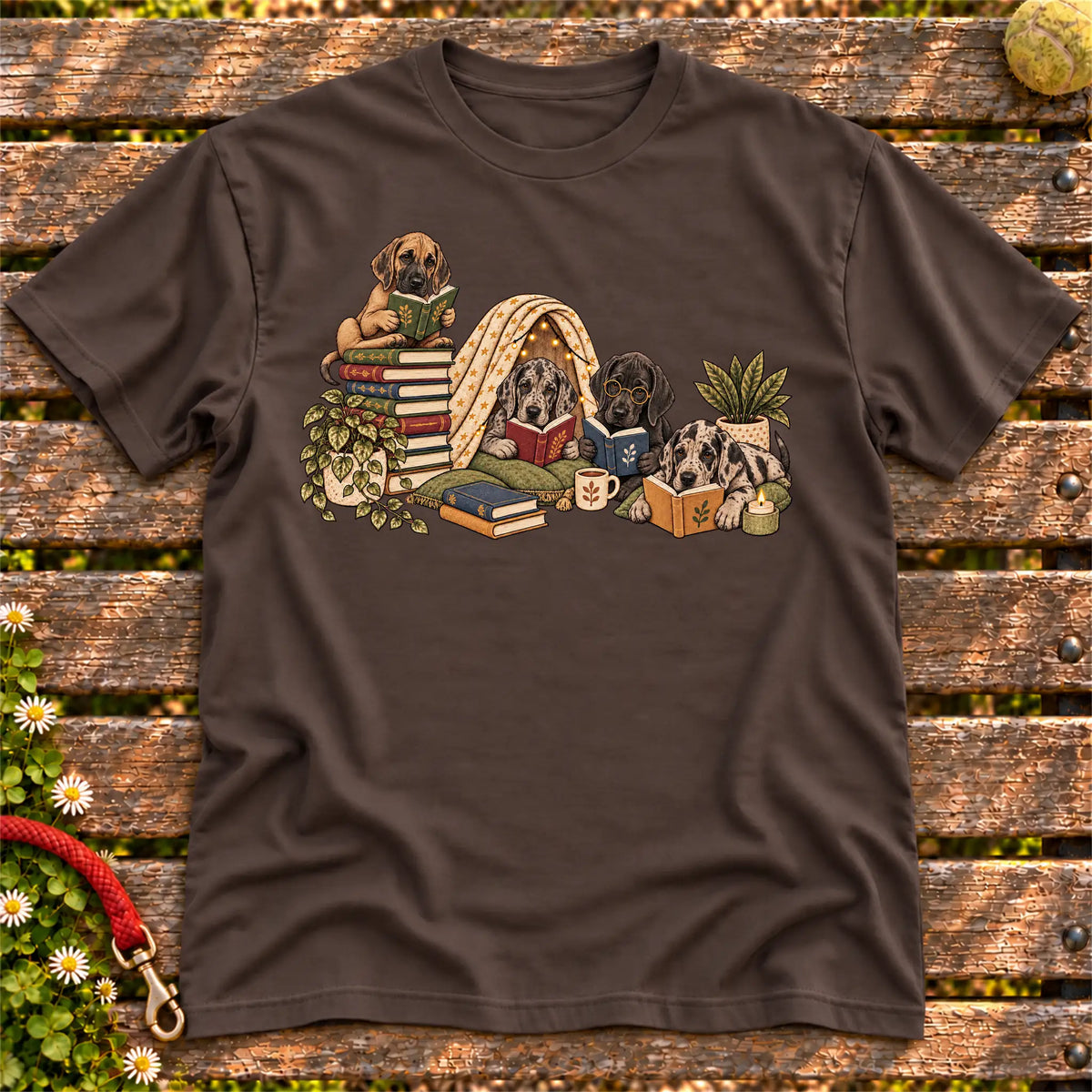 Great Dane puppies reading books in a cozy blanket fort on a Dark Chocolate T-shirt