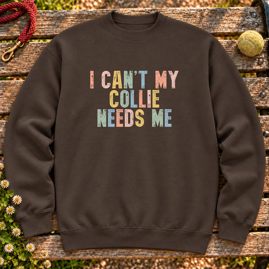 I Can't My Collie Needs Me text design on a Dark Chocolate crewneck sweatshirt