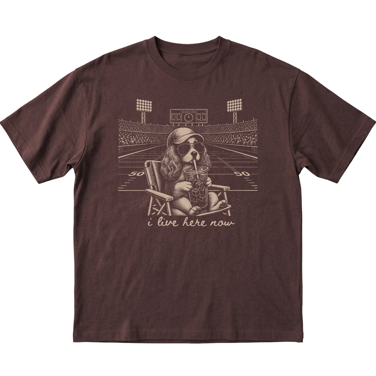 Dark Chocolate I live here now Cavalier King Charles Spaniel T-shirt, laid flat